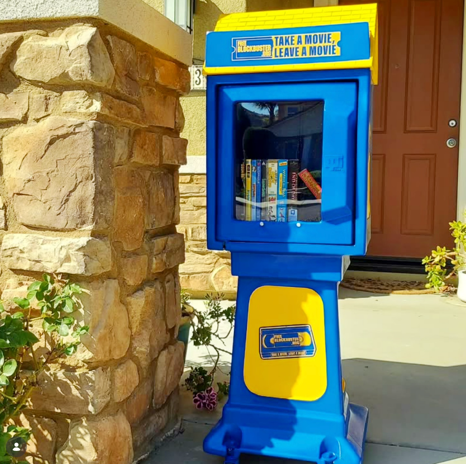 Free Blockbuster stand on home front porch