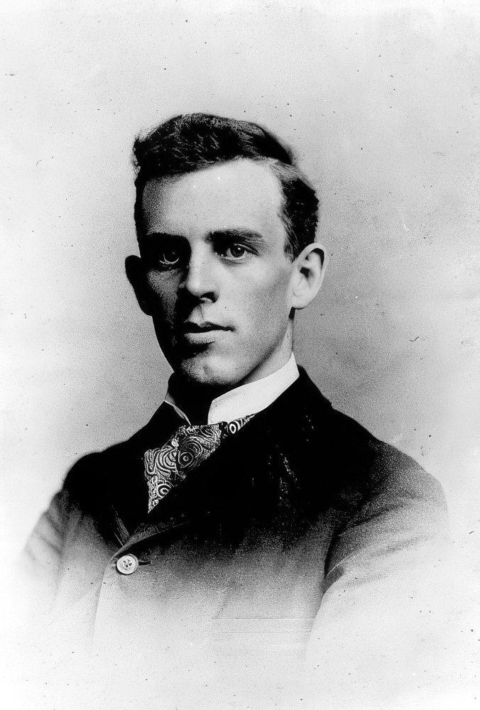 Portrait of handsome young white man in a vintage jacket.