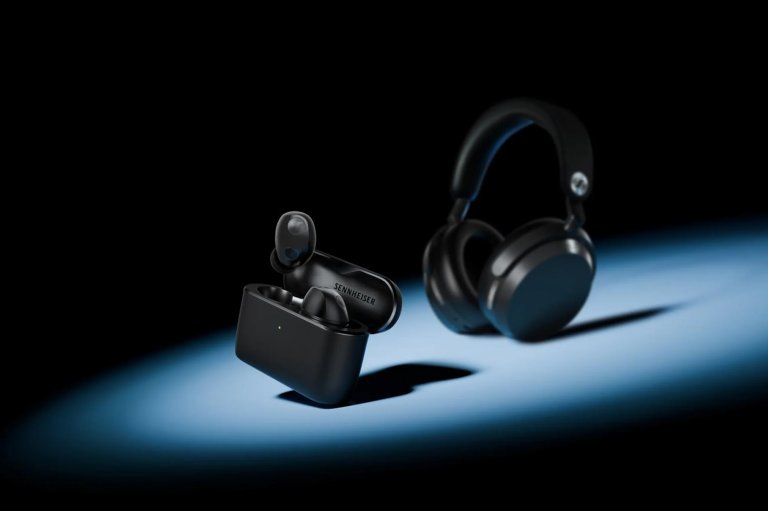 The MOMENTUM True Wireless 5 shown in Graphite in front of the MOMENTUM 5 Wireless headphones