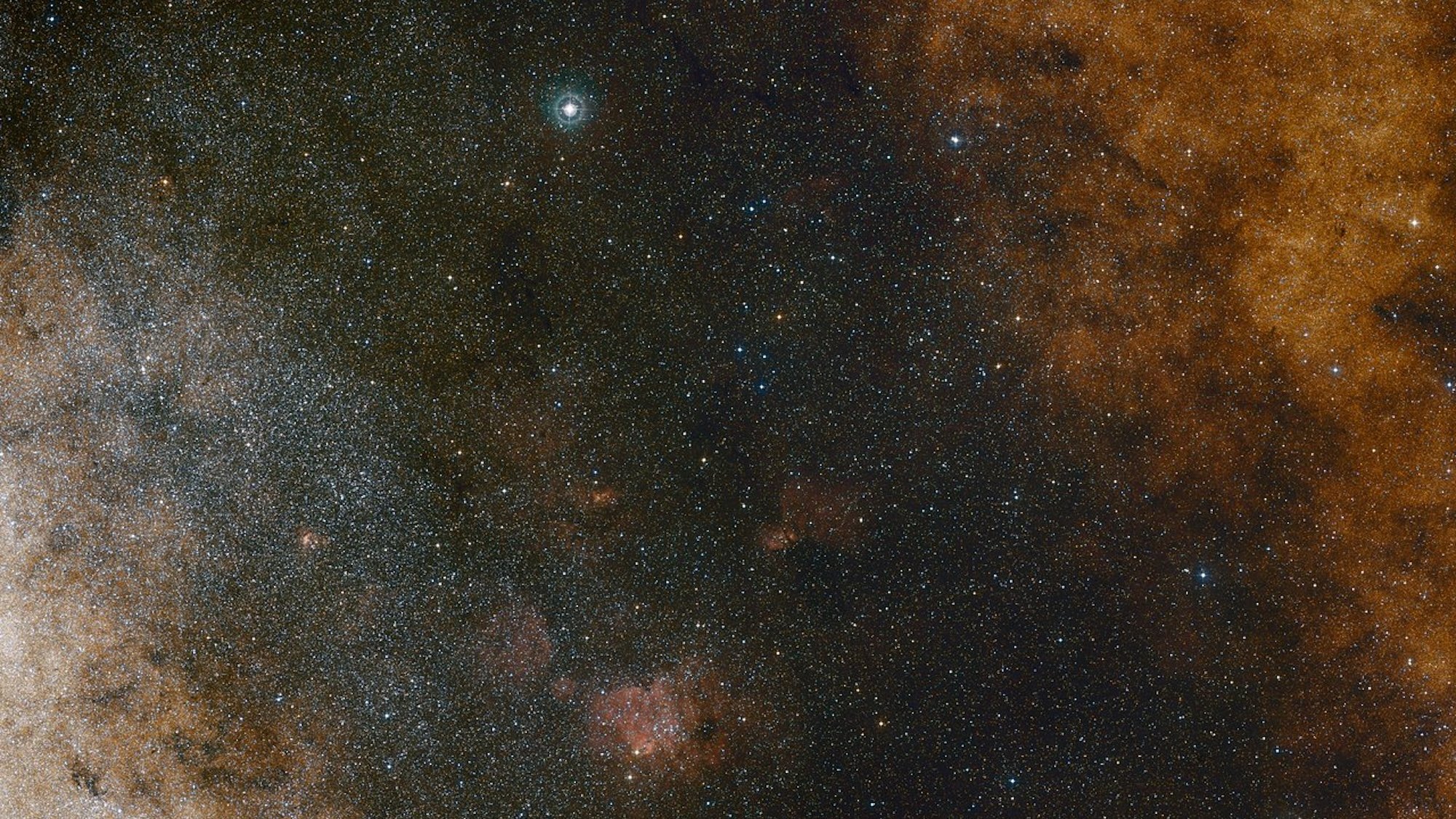 This visible light wide-field view shows the rich star clouds in the constellation of Sagittarius (the Archer) in the direction of the centre of our Milky Way galaxy. The entire image is filled with vast numbers of stars — but far more remain hidden behind clouds of dust and are only revealed in infrared images. This view was created from photographs in red and blue light and form part of the Digitized Sky Survey 2. The field of view is approximately 3.5 degrees x 3.6 degrees.