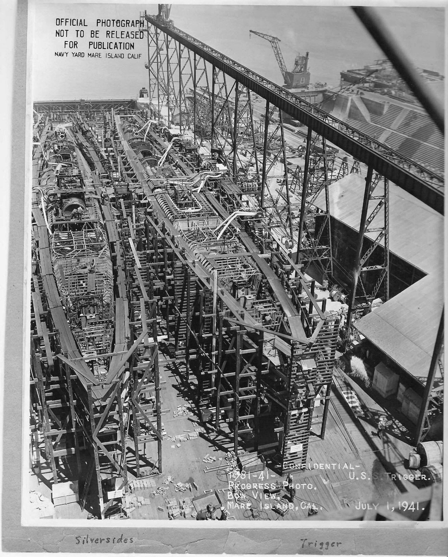 An archival photo from 1941 show the USS Trigger and Silversides under construction side-by-side at Mare Island Navy Yard in California.