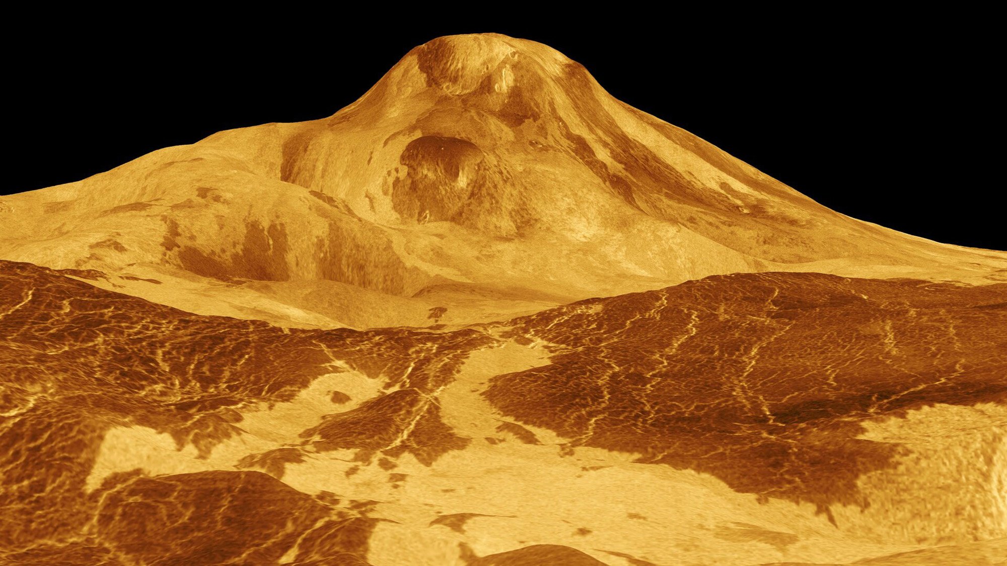 Molten yellow surface with hill on black background.