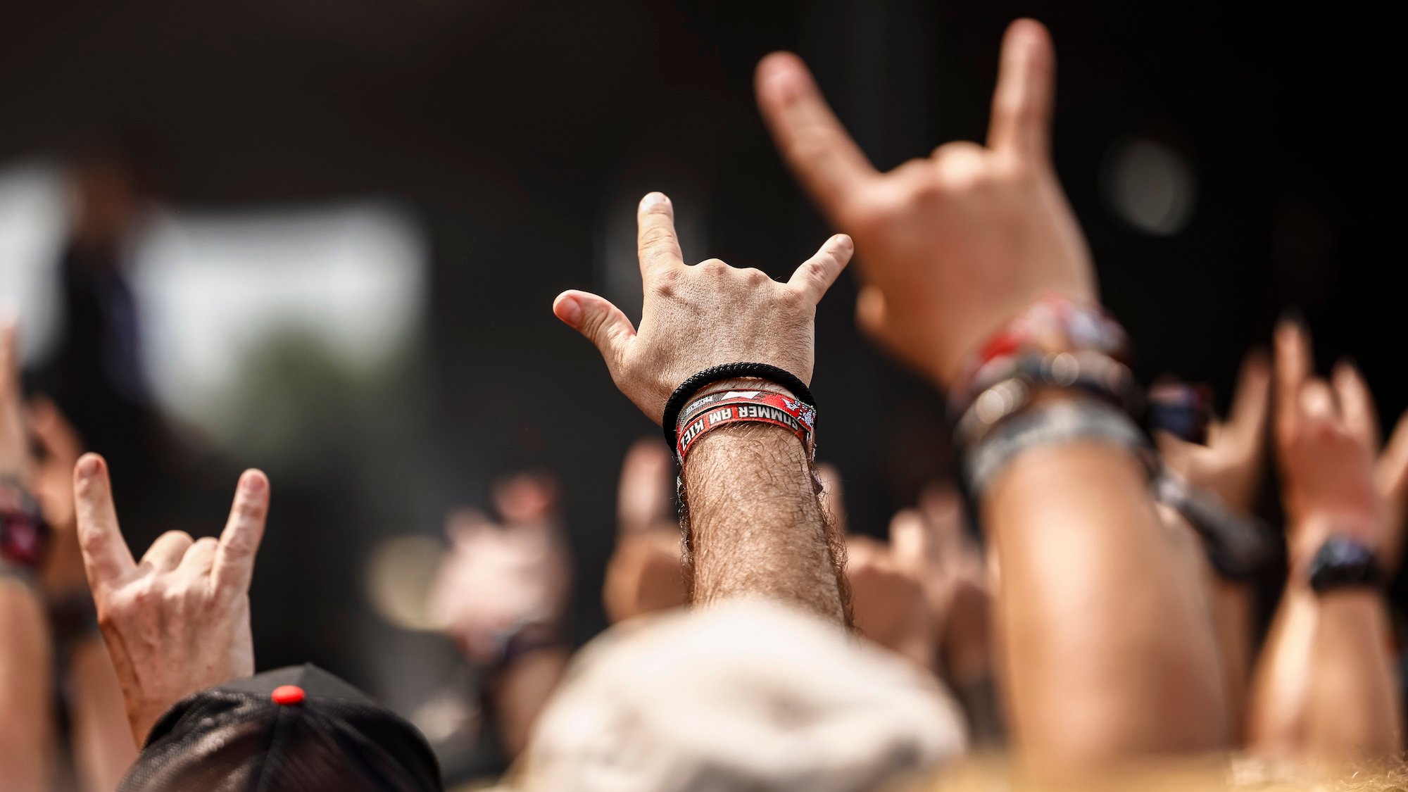 30 July 2026, Schleswig-Holstein, Wacken: Fans celebrate during a concert by the band H-Blockx in front of the "Louder" stage at Wacken Open Air (W:O:A). W:O:A is considered the world's largest heavy metal festival. Photo: Frank Molter/dpa (Photo by Frank Molter/picture alliance via Getty Images)
