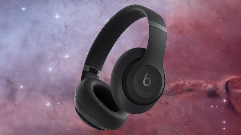 Black Beats Studio Pro Wireless Headphones on a solar background