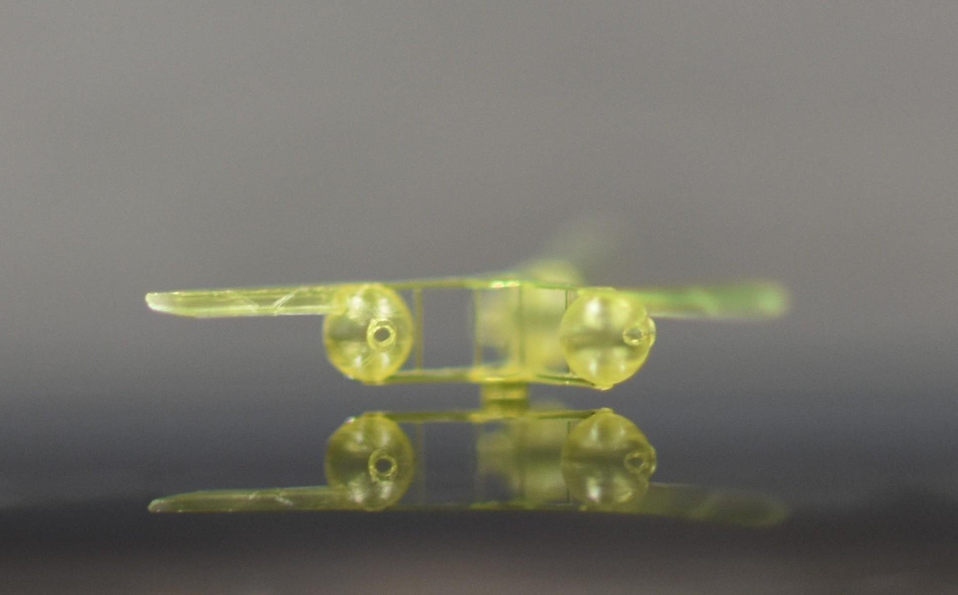 a small, clear yellow drone