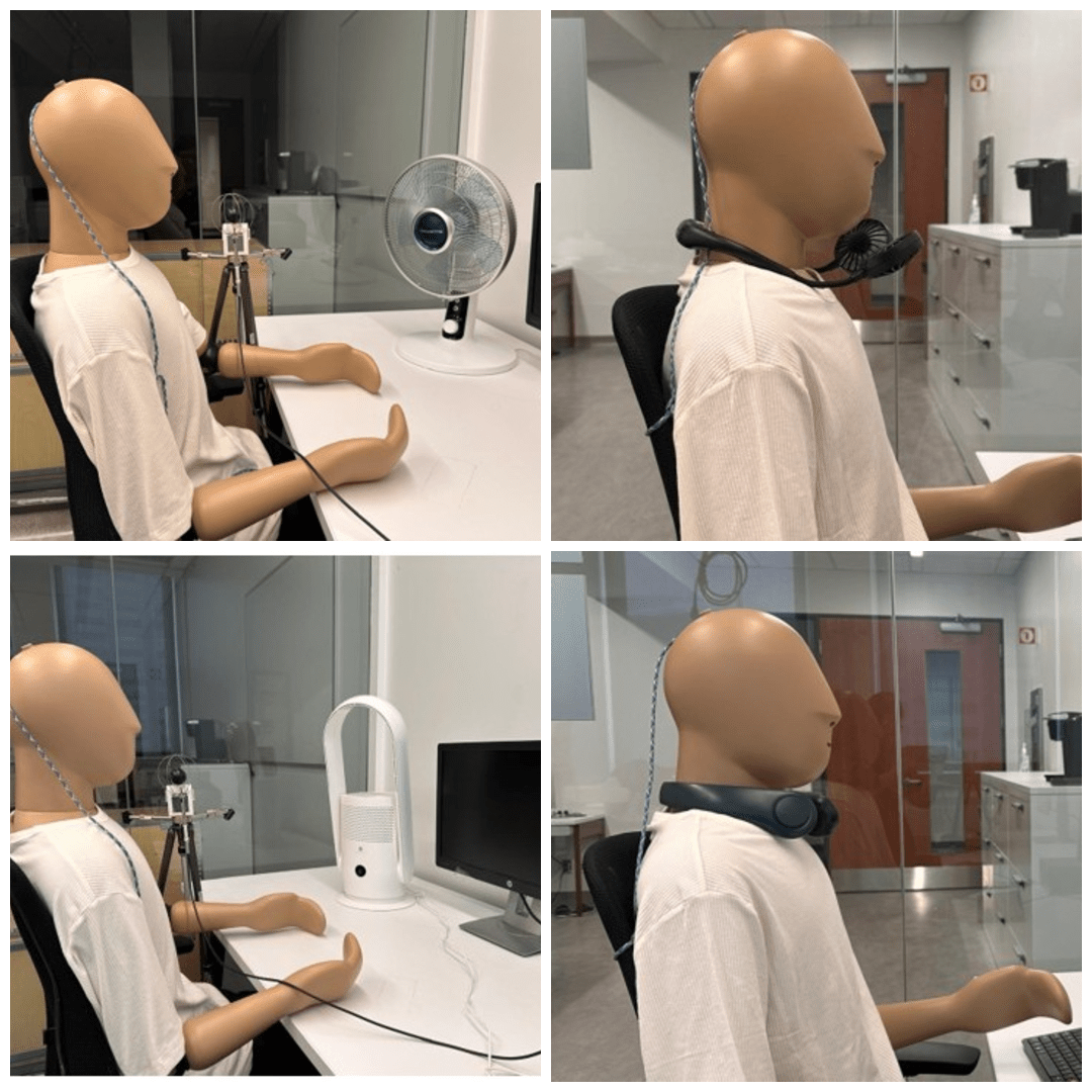 a test manikin sitting at a desk and testing four fans: a neck fan, a face fan, a bladed desktop fan, and a bladeless desk fan