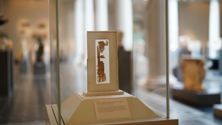 a fragment of parchment on display in a musuem