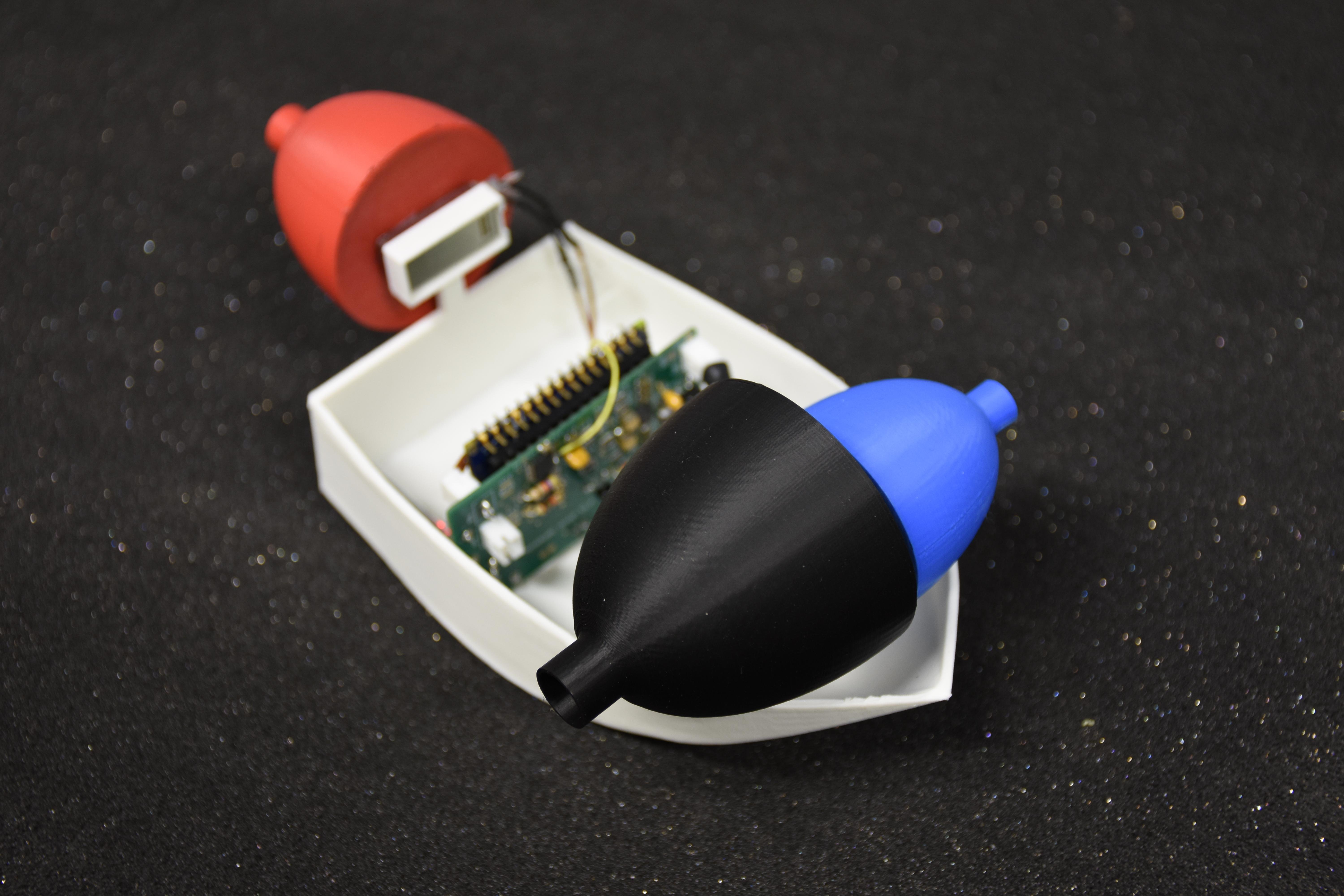 a small white boat with an electrical circuit