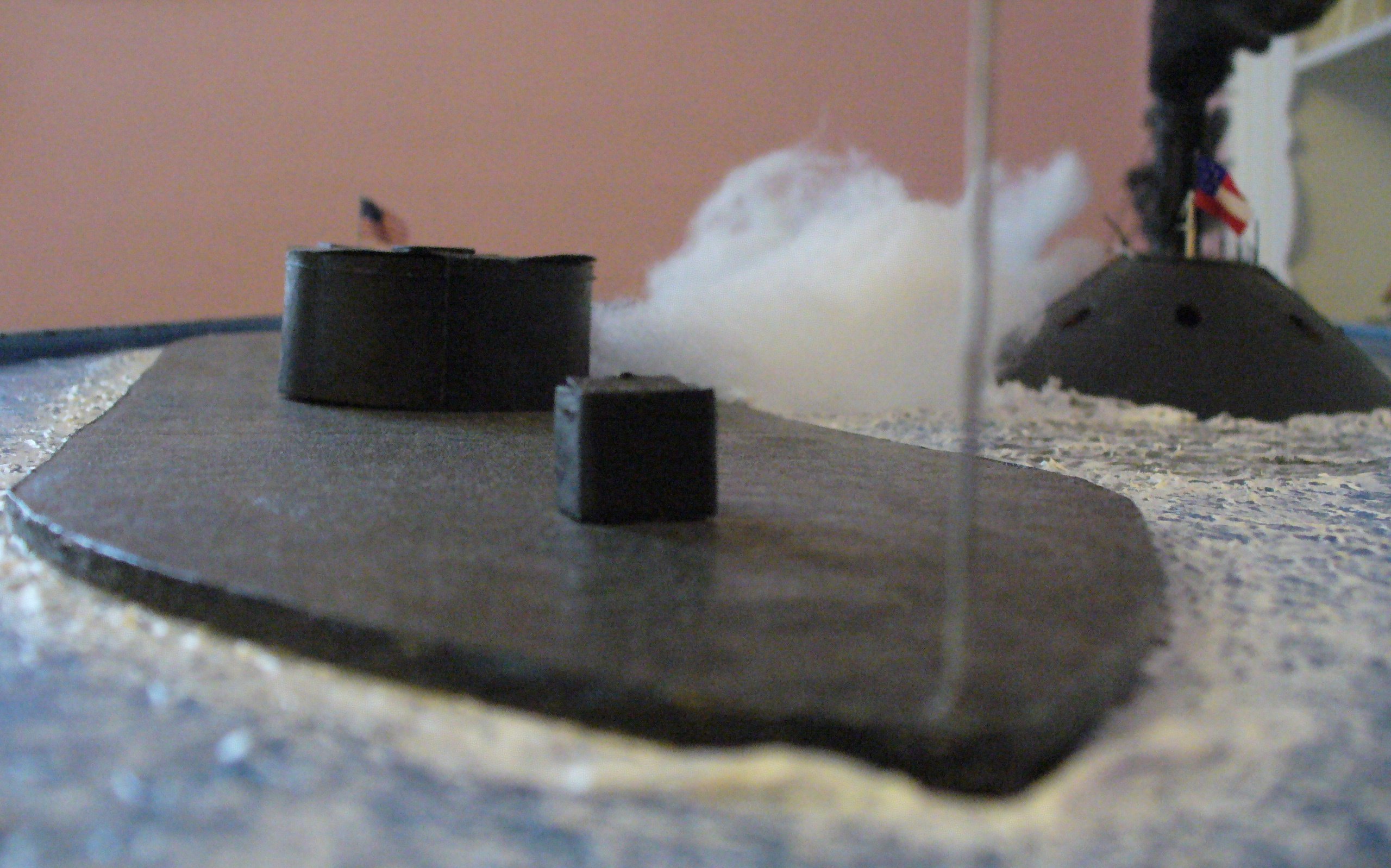 a diorama of an ironclad warship