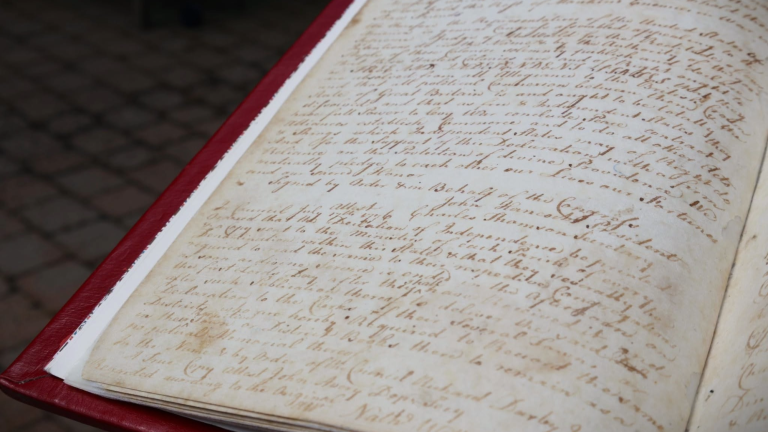 a handwritten copy of the declaration of independence