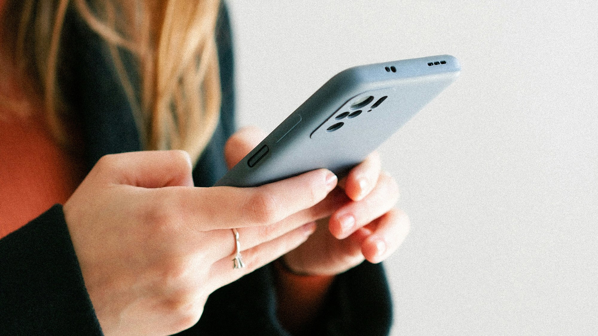 A person holding an iphone