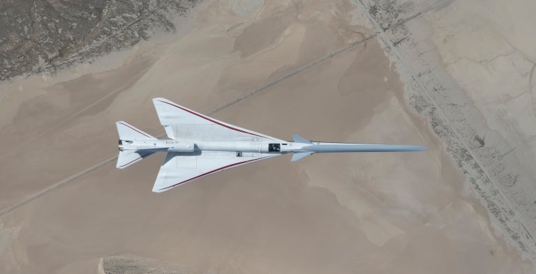 NASA’s X-59 quiet supersonic jet flies over the Mojave Desert during its third flight on Thursday, March 26, 2026, from NASA’s Armstrong Flight Research Center in Edwards, California. The aircraft departed and landed at Edwards Air Force Base, completing its approximate one-hour flight and providing the team with significant data for future flights.
