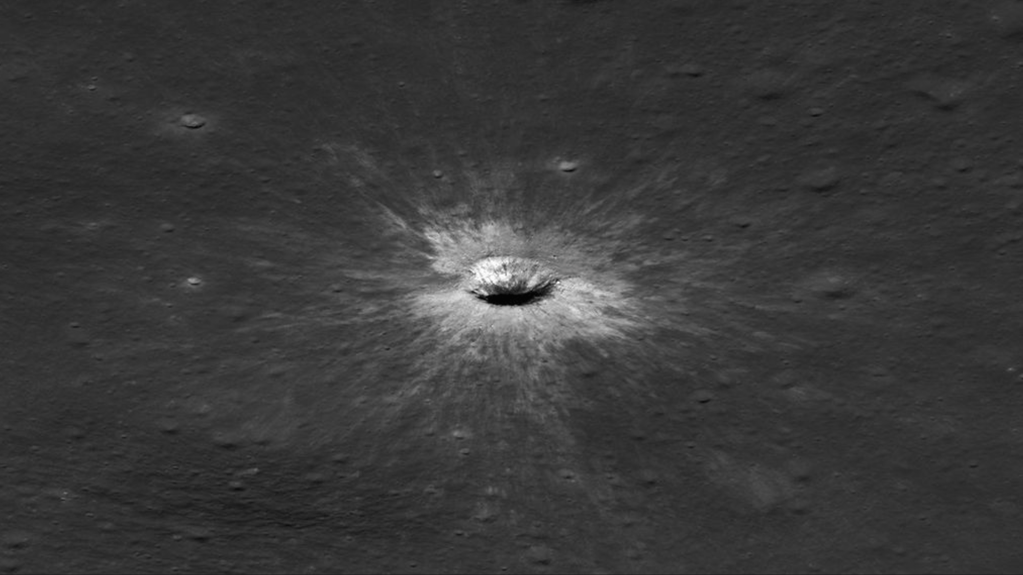 An image from the Lunar Reconnaissance Orbiter showcasing a new, 768-foot-wide lunar crater