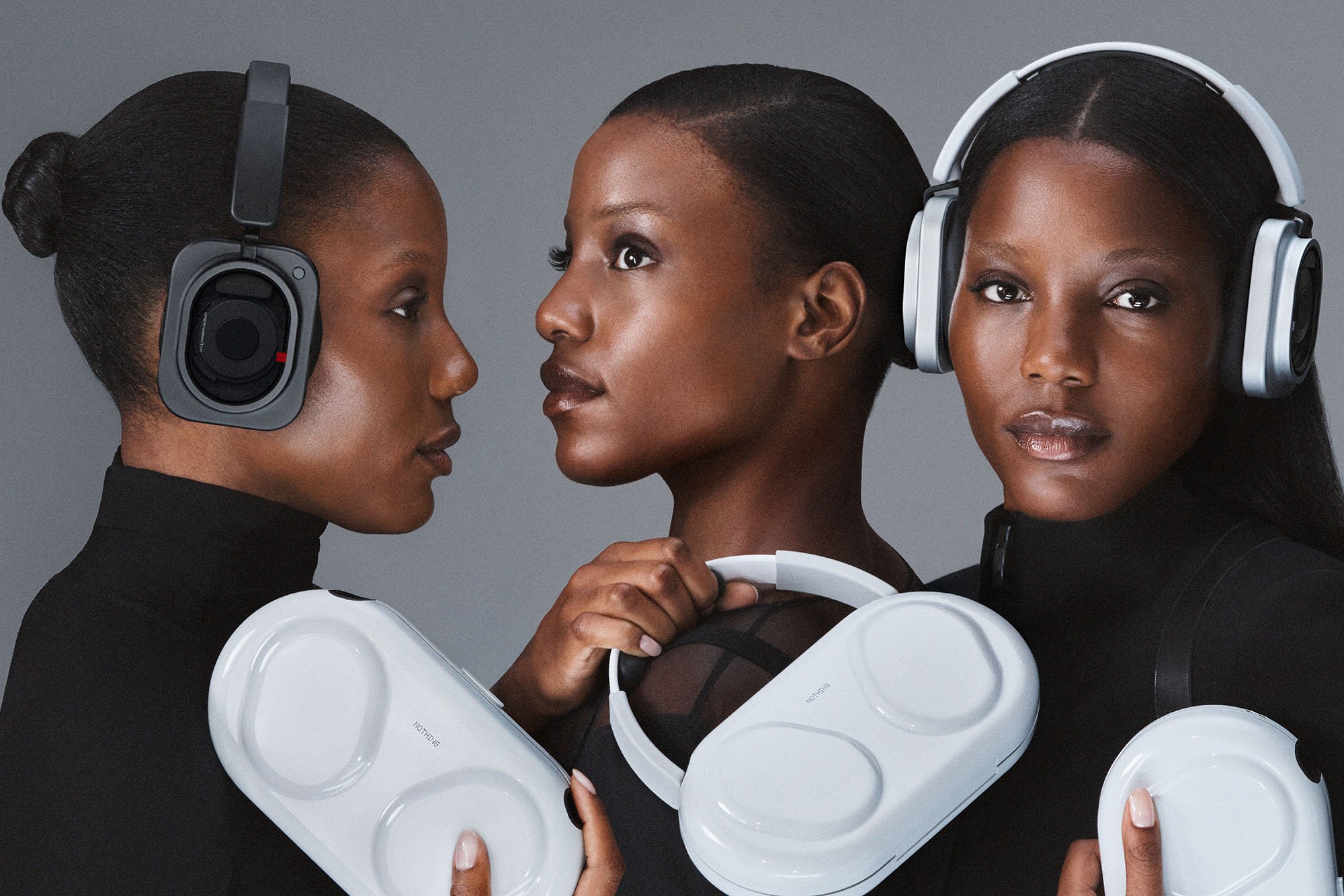 Female triplets shown wearing the Nothing Headphone (1) Pro and holding its carrying case