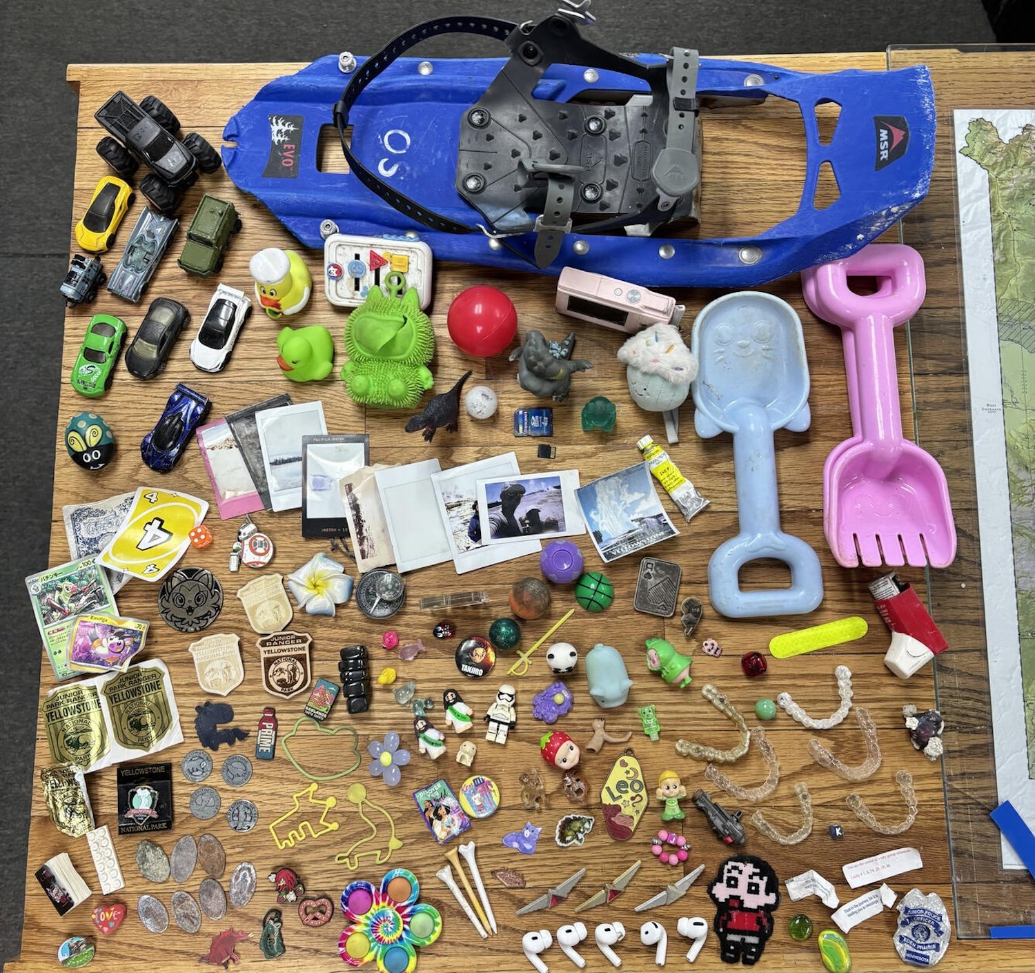 Particularly odd lost items including retainers, trading cards, golf tees, and AirPods