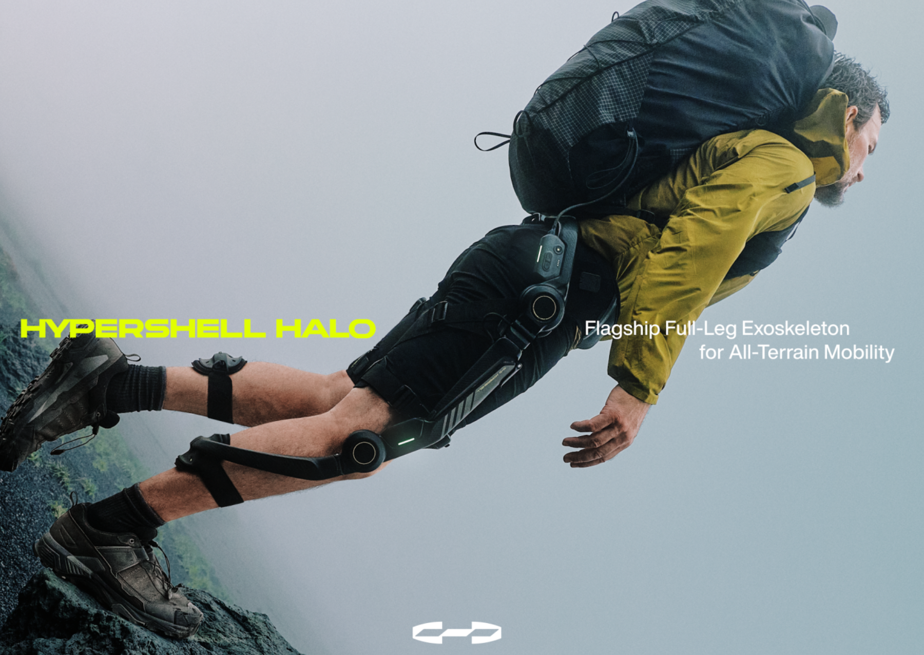 a man wearing an exoskeleton on his legs while hiking