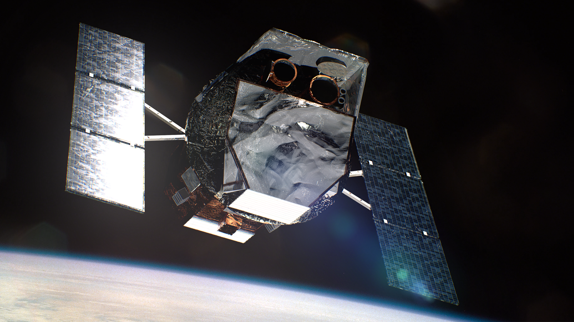 This artist’s concept shows NASA’s Neil Gehrels Swift Observatory orbiting above Earth.