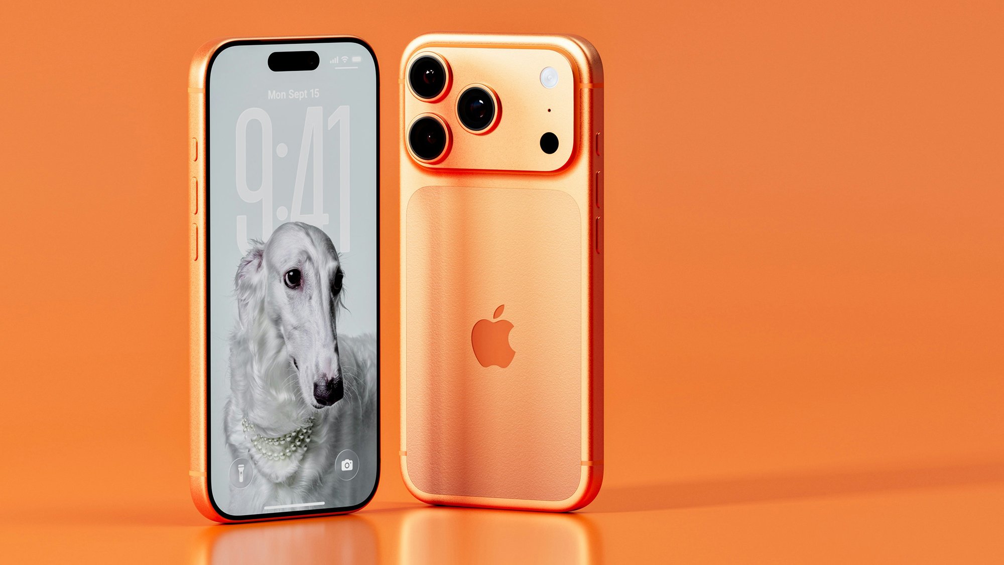 An orange iPhone against an orange background