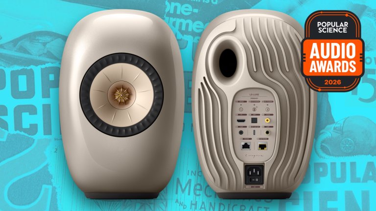 Pair of KEF LS LUXE wireless speakers in titanium, one shown from the front and one from the ribbed back