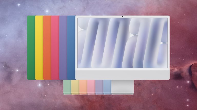 A silver iMac with M6 in front of fanned panels in green, yellow, orange, pink, purple, and blue.