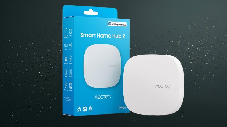 White Aeotec Smart-Home Hub2 against a green speckled practical gift guide background