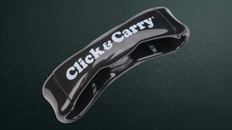 Black Click Carry Ergonomic Grocery Bag Carrier Handle Bag Holder against a green speckled practical gift guide background