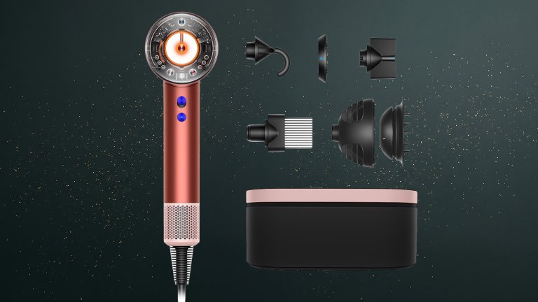 Dyson Supersonic Nural hair dryer against a green speckled practical gift guide background