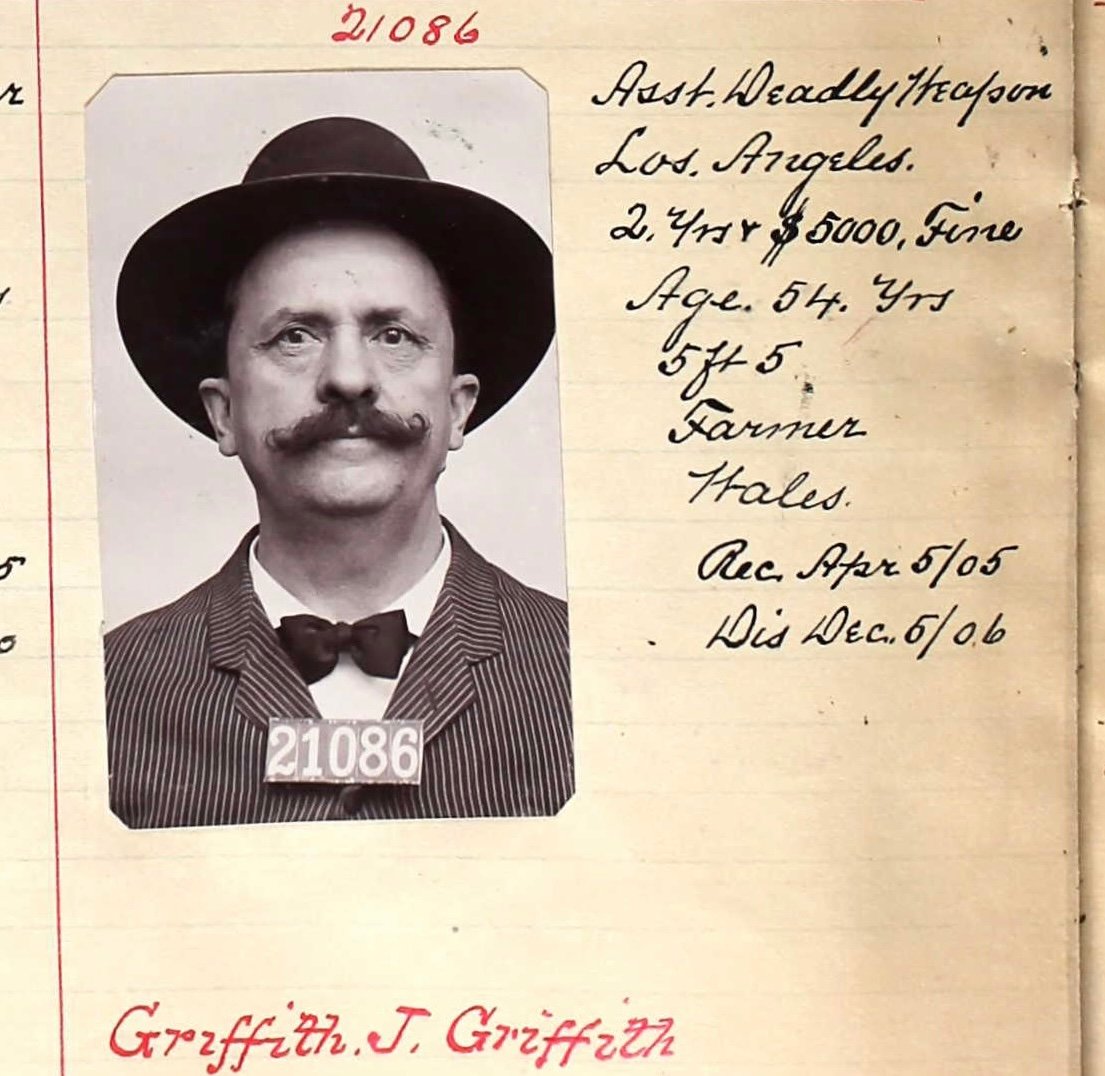 Mugshot of white man with mustache.