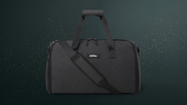 Halfday Garment Duffel on a green sparkly travel gift guide background