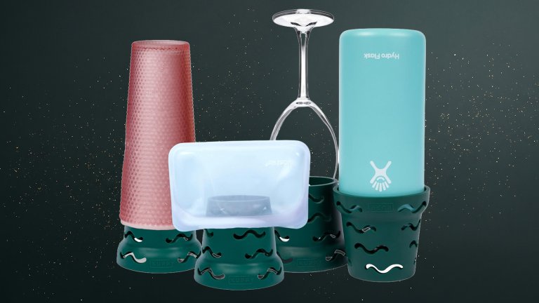 Several bottles and cups and bags on Kuppy stands against a green speckled practical gift guide background