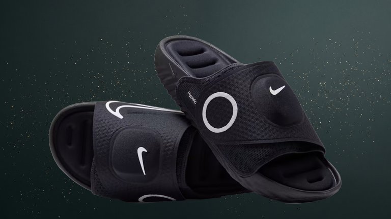 Black Nike Hyperice Nike Air Zoom Hyperslide against a green speckled practical gift guide background