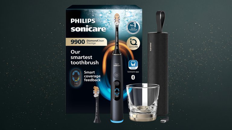 Philips Sonicare Prestige 9900 DiamondClean electric toothbrush and box against a green speckled practical gift guide background