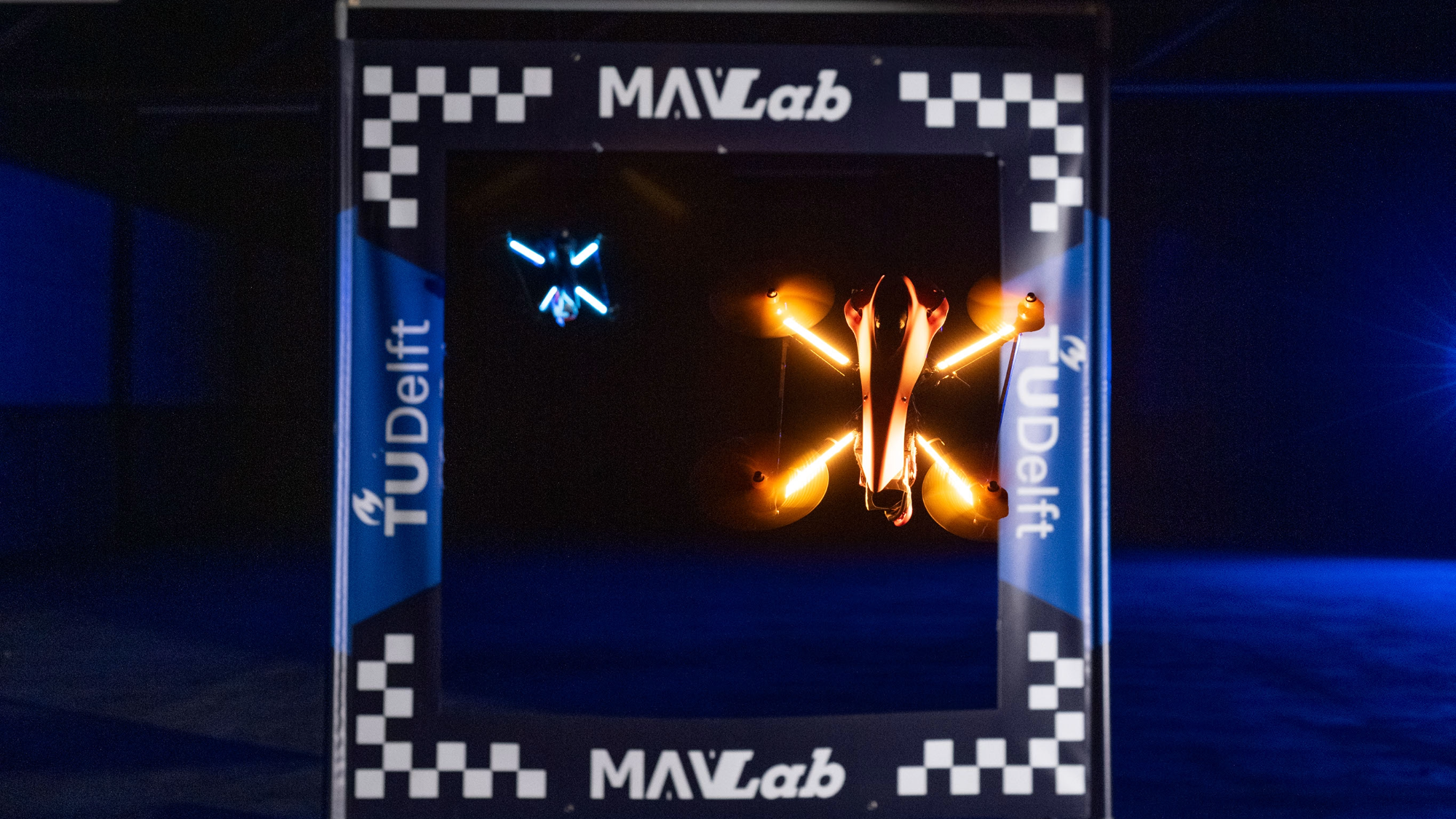 The autonomous racing drone MonoRace flies through a gate during trials