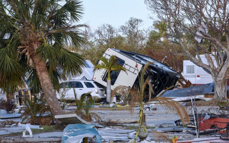 FORT MYERS BEACH, FLORIDA, UNITED STATES - 2022/10/30: An overturned travel trailer is seen in a mobile home park in Fort Myers Beach, Florida a month after Hurricane Ian made landfall on September 28 as a Category 4 hurricane, causing an estimated $67 billion in insured losses and at least 127 storm-related deaths in Florida. (Photo by Paul Hennessy/SOPA Images/LightRocket via Getty Images)