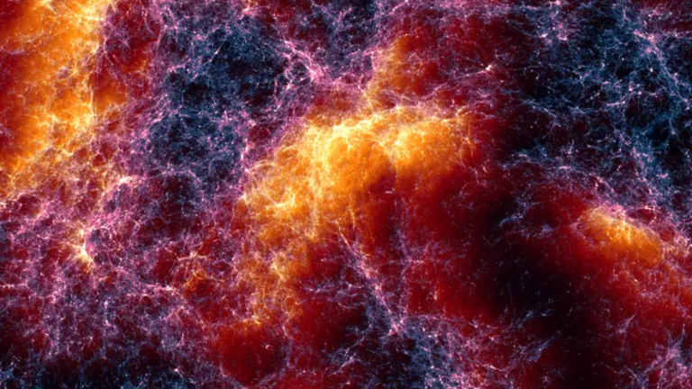 A rendering of the cosmic web about 650 million light-years across, produced by the Lumina simulation. The fine filaments represent dark matter, and the warm orange and yellow tones highlight where gas is moving the fastest between galaxy clusters.