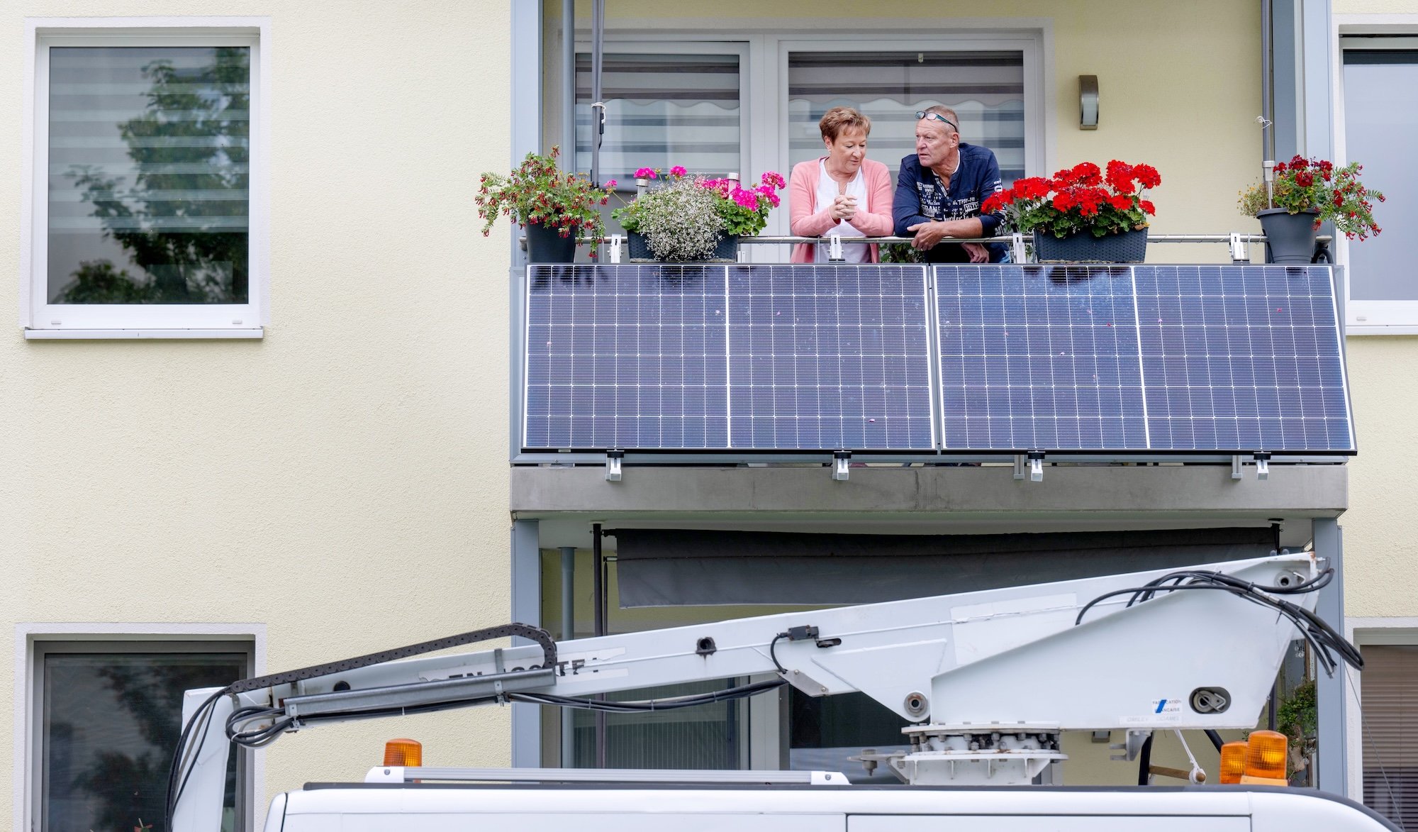 couple on balcony with solar power