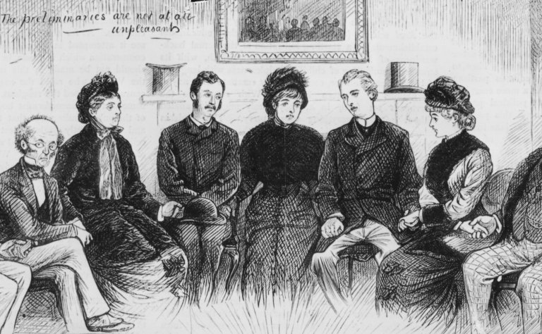 A group of people prepare to hold a seance in an attempt to make contact with the dead, circa 1880. Original Publication : Graphic Magazine. (Photo by Hulton Archive/Getty Images)